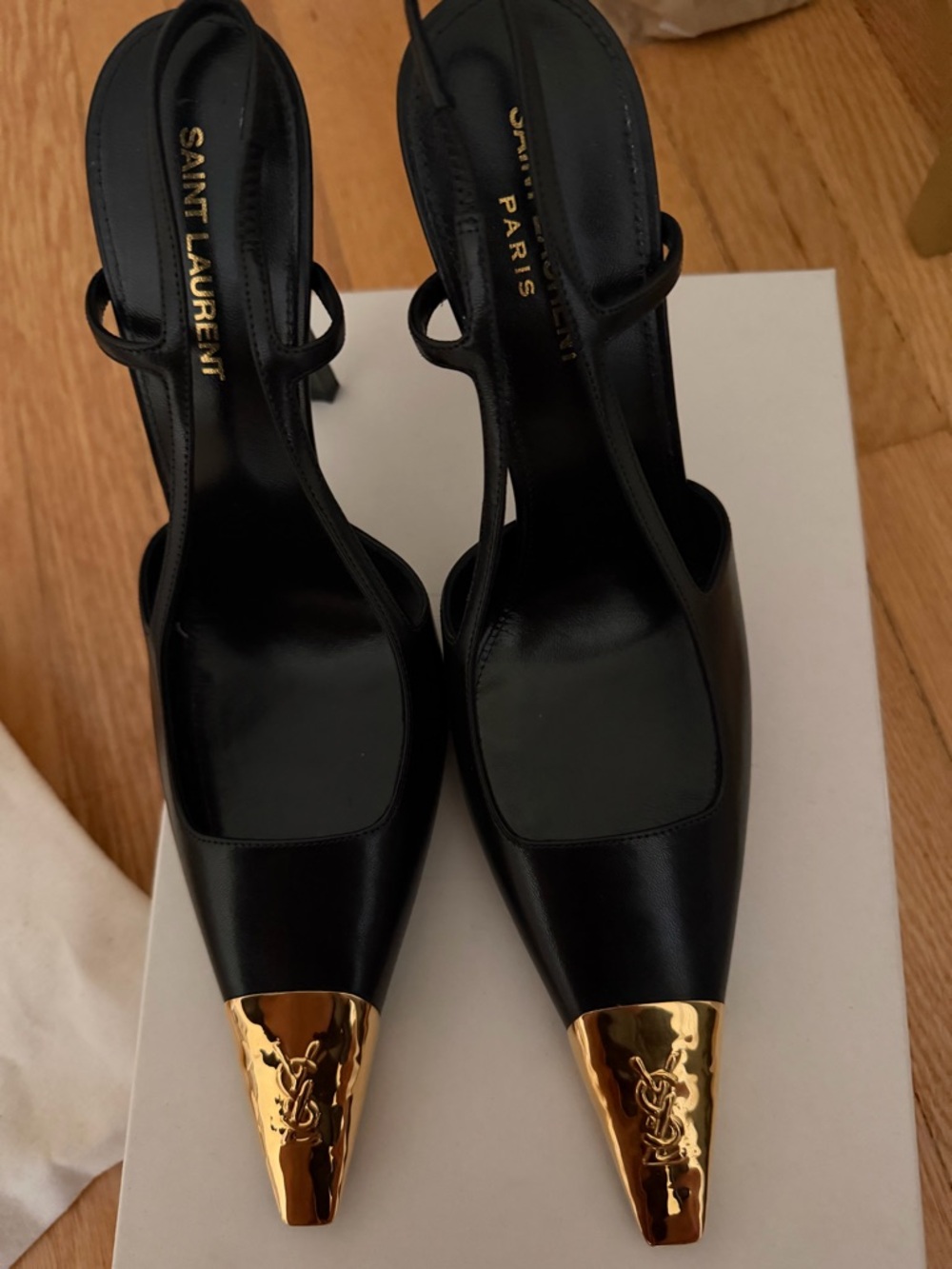 Saint Laurent Black Leather Slingback Pumps with Gold Toe Caps